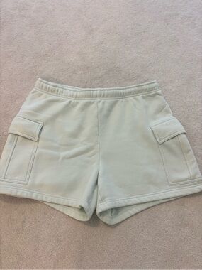 light green Aritzia sweat shorts